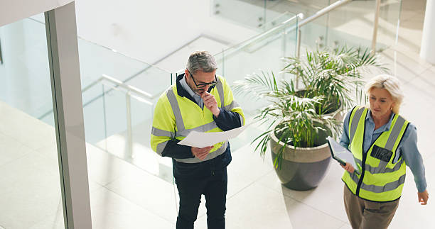 istock Thinking, architect and man with blueprint for office renovation, construction and maintenance above. Mature engineer, floor plan and document for building, insight or problem solving with coworker 2236931414