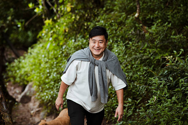 Traveler Enjoying Hike in Tropical Forest