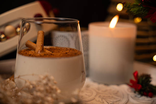 istock Rompope with cinnamon sticks and christmas decorations 2236932353