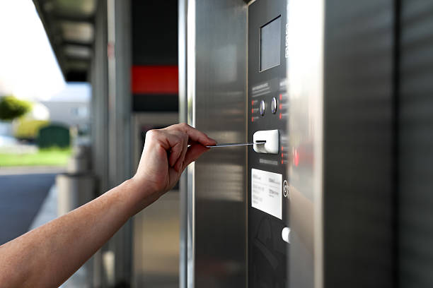 istock Hand inserts card into sleek payment terminal, reflecting modern technology and urban convenience. Perfect for illustrating contactless payment solutions. 2236933863