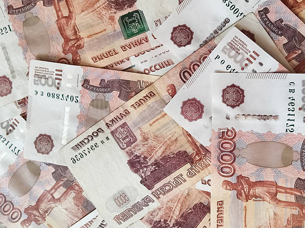 istock Five thousand Russian ruble banknotes are mixed up on the table 2236935813