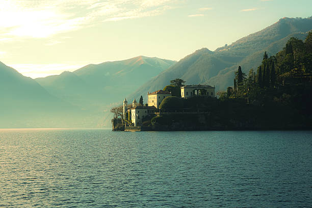 istock Villa on Lake Como at sunset with mountain backdrop 2236941402