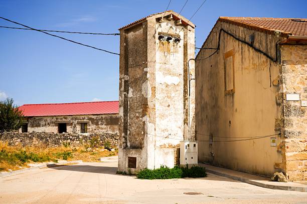 istock Old buildings and electrical towers. 2236944674