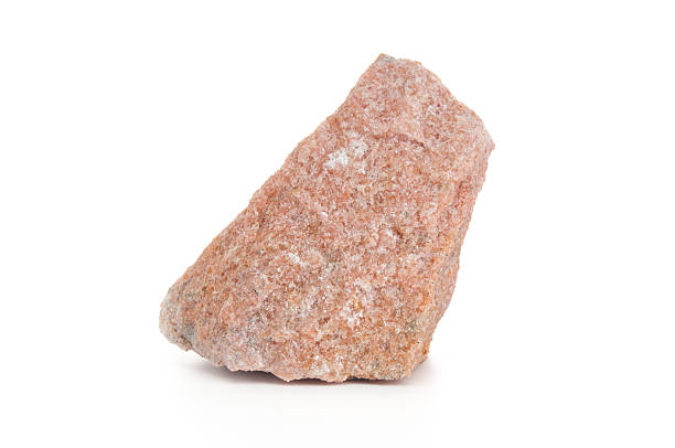 istock Granite stone close up isolated on white background 2236949127