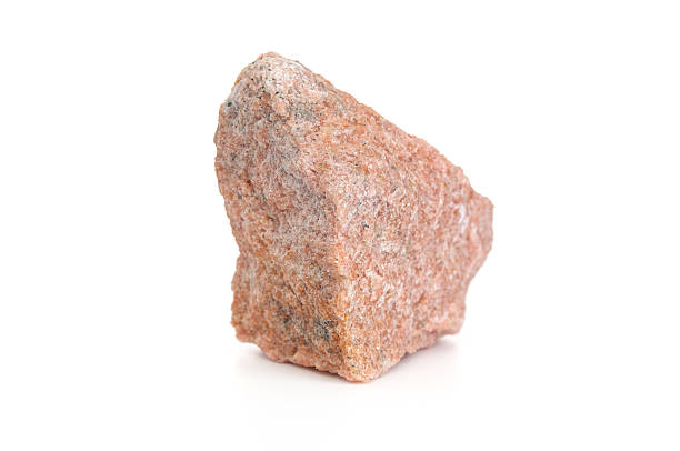 istock Granite stone close up isolated on white background 2236949156