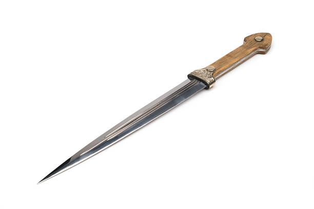 istock Ornate antique  dagger close up  isolated on white background 2236949197