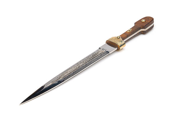 Ornate antique  dagger close up  isolated on white background