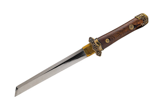 istock Ornate antique  dagger close up  isolated on white background 2236949239