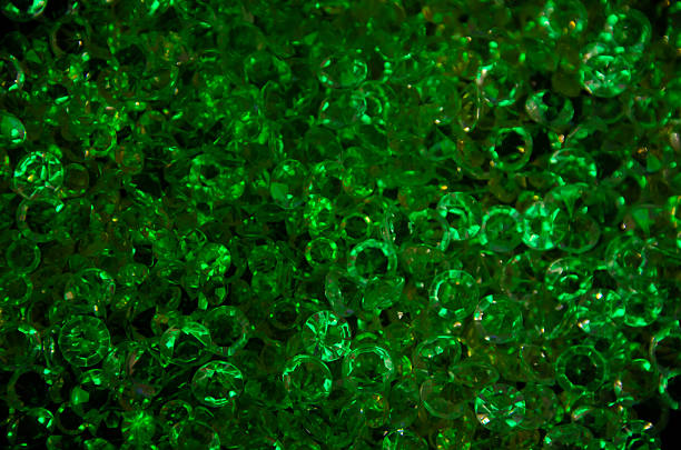 istock Bright festive background. Green crystals on a dark background. 2236951091
