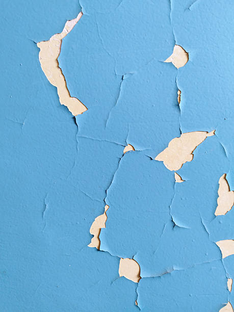 istock Old texture. residential building. Cracked blue paint on wall. Peeling off painted background. House repair. Housing service. Plaster. Damaged. terrible condition. Poverty concept. Textured effect. 2236952702
