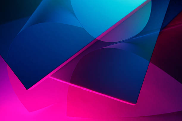 istock A modern, abstract background with overlapping geometric shapes in vibrant blue and magenta. 2236957764