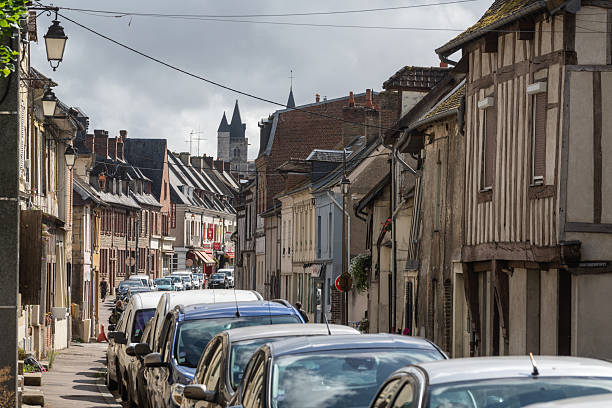 Les Andelys, France - August 28, 2025: The village of Les Andelys in France with beautifull old architecture with houses and the church
