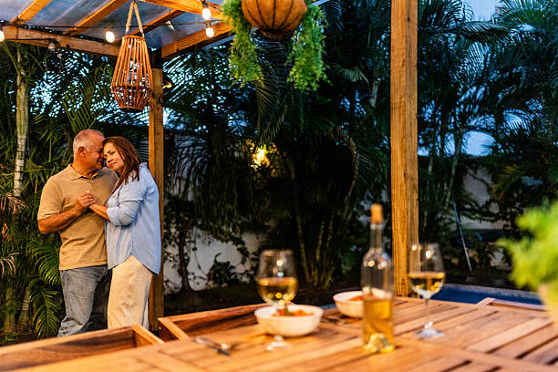 istock Senior couple dancing on back yard at home 2236962810