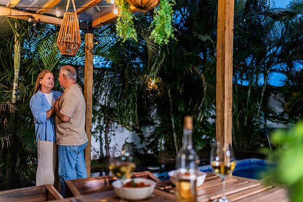istock Senior couple dancing on back yard at home 2236962829