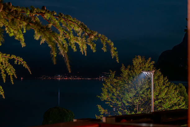 Summer night color view for Brienzersee lake in Bonigen Switzerland