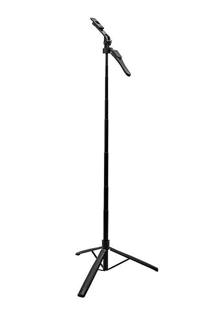 istock A black selfie stick fully extended and standing on its tripod legs. 2236974847