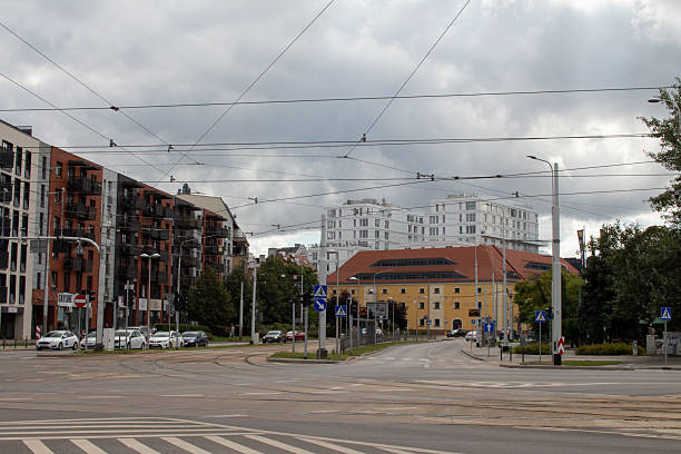 istock Urban intersection featuring modern and historical architecture on a cloudy day 2236979836