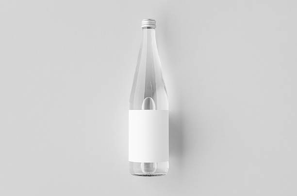 istock Water bottle mockup with blank label, clear glass 2236990518