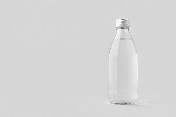 istock Small water bottle mockup, clear glass, copyspace. 2236990928