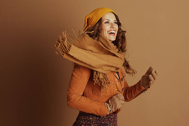 istock Expressive Joy: Woman Laughing in Autumn Style 2236992796