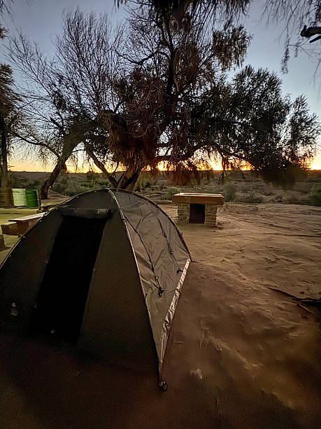 istock Small tent for an overnight sleep on the road trip 2237000008