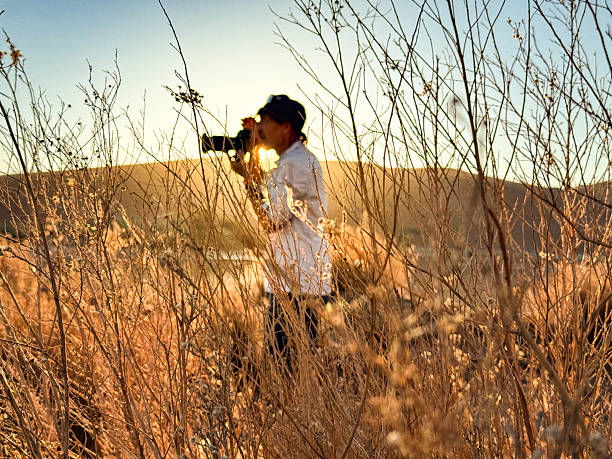 Photographer discovering Sossusvlei in Namib desert