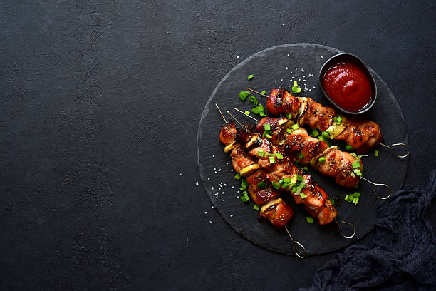 istock Grilled chicken kebab skewers . Top view with copy space. 2237005909
