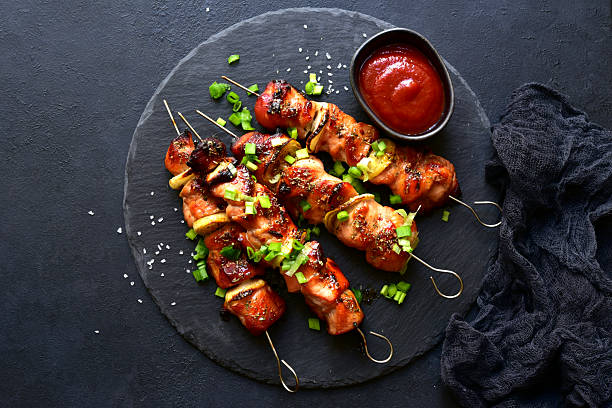 istock Grilled chicken kebab skewers . Top view with copy space. 2237005974