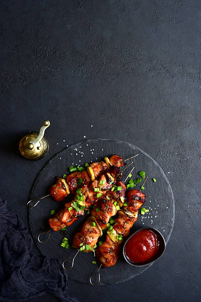 istock Grilled chicken kebab skewers . Top view with copy space. 2237005975
