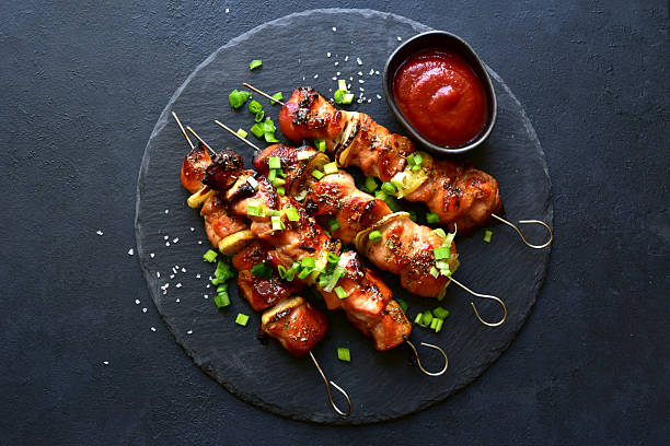 istock Grilled chicken kebab skewers . Top view with copy space. 2237006123