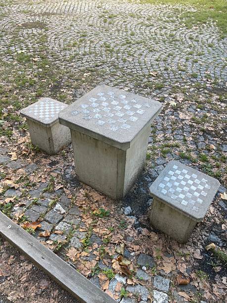 istock In a park, there is a sturdy concrete table featuring a chess board 2237014559
