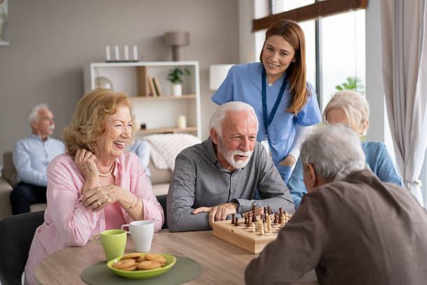 istock Seniors celebrating chess victory with joyous laughter 2237014702
