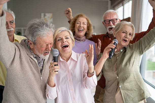 istock Seniors enjoying singing together in a vibrant setting 2237014723