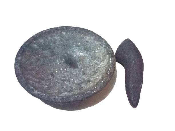 istock Mortar and pestle made of stone material with isolated white background 2237017982