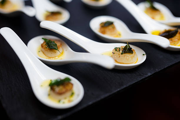 istock Gourmet Pan-Seared Scallops on Serving Spoons 2237019904