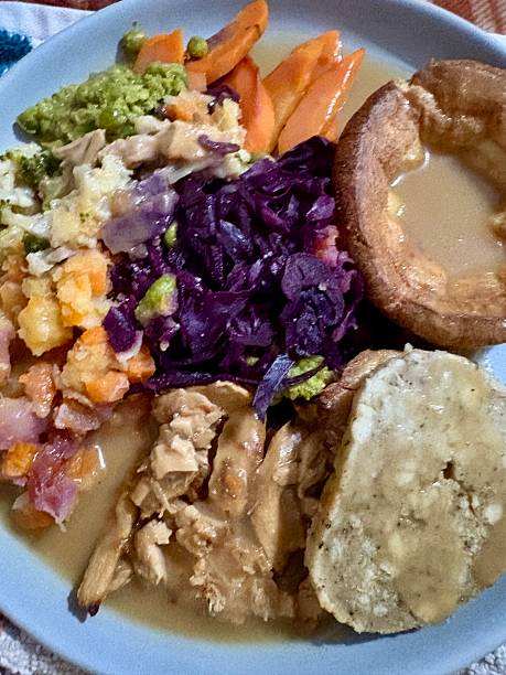 Roast turkey with gravy vegetables stuffing and Yorkshire pudding
