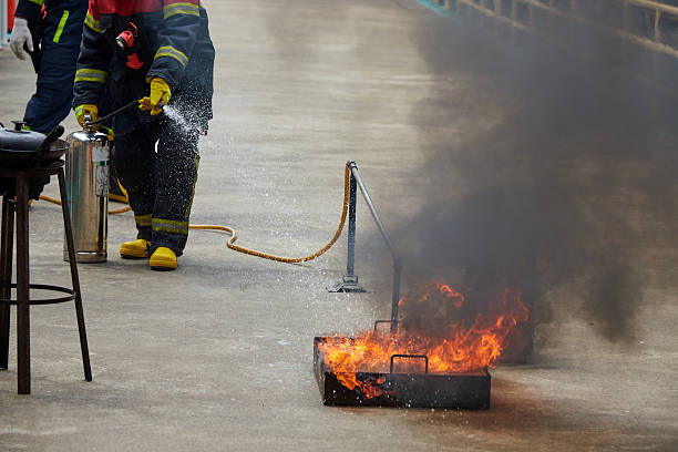 istock Cropped view of people in fire extinguishing approach training 2237025519