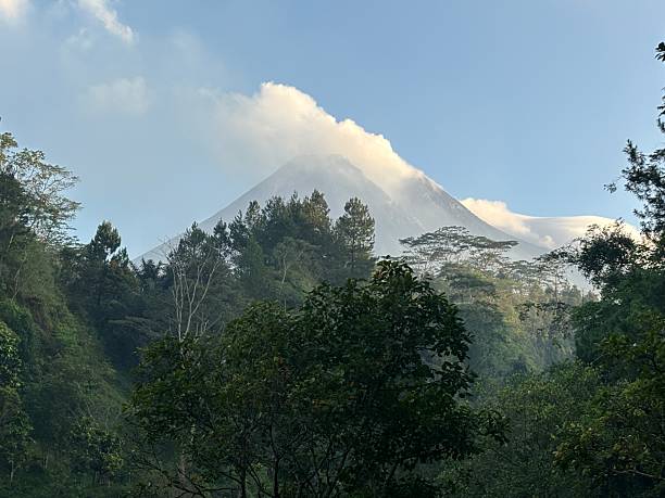 istock Volcano Peak Covered with Mist above Tropical Forest Valley 2237027928