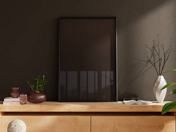 istock Black picture frame on a wooden sideboard, offering a creative space for your text or artwork- 3D rendering 2237030956