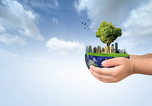istock Hand holding modern Green city creative concept. 2237033549