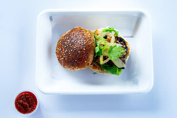 istock Open-Faced Hamburger with Sesame Seed Buns on a White Takwaway Tray 2237036019