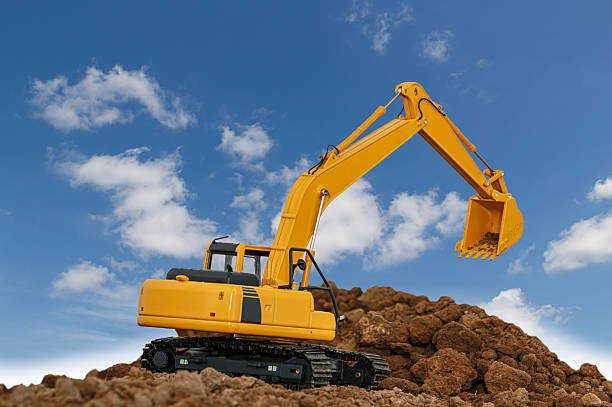 istock Excavator  are digging  soil in the construction site 2237037476