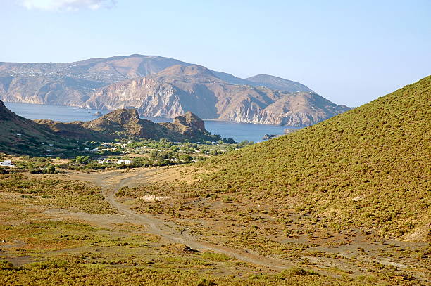 People walking on the edge of the Stefanos crater, Nissyros, Greece