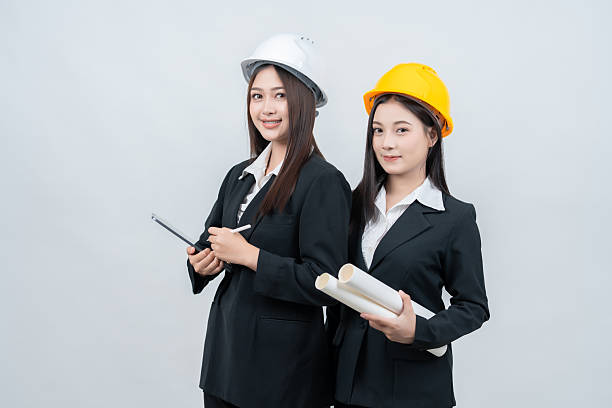 istock Two female engineers and an architect are collaborating with a laptop, carefully planning strategies that will influence the international industry and ensure long-term development and success. 2237043911