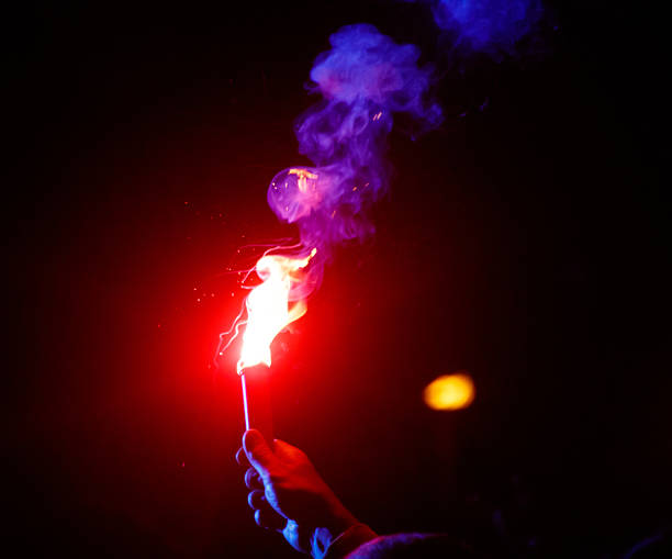 istock A person is holding a lit match in their hand 2237049021