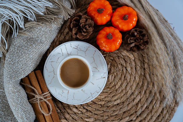 istock Autumn coffee flat lay with rope, cinnamon, and orange flowers 2237049393