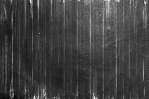 Black paper with bands printed from a bad printer