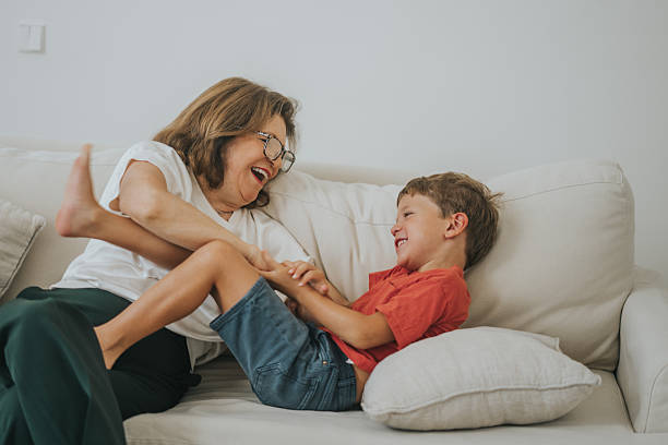 istock Woman playing with her grandson 2237050031