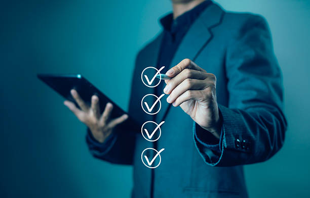 istock Businessman checking checkbox, Business performance checklist concept, Survey, Check off checklist, Fill out online form, Document management system, DMS, Performance appraisal 2237050597