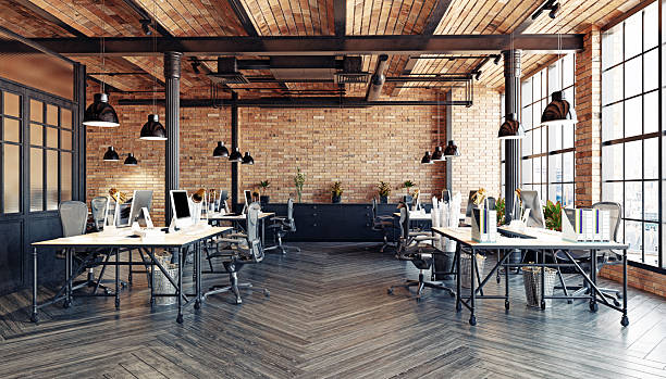 istock Modern industrial loft office interior. Empty open-plan workspace with brick walls and wooden floors. 3D rendering of a contemporary co-working space. 2237056464